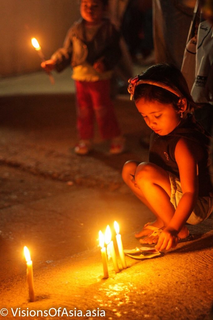Little girl with candle
