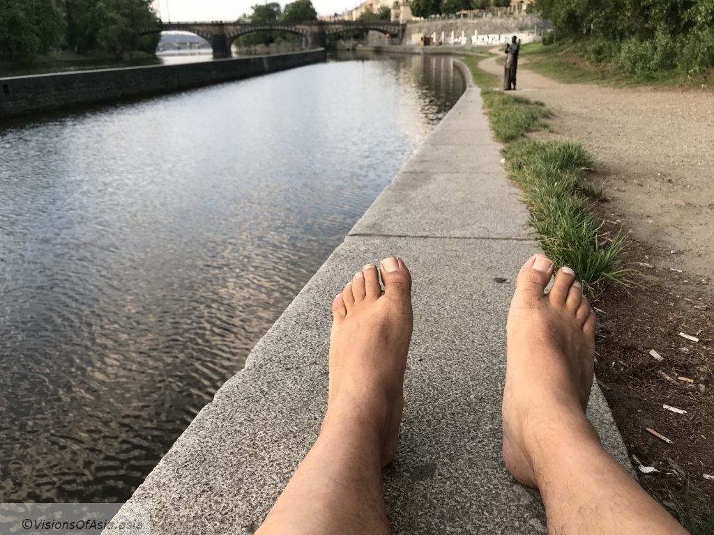 Barefoot running in Prague, on the banks of the Moldau