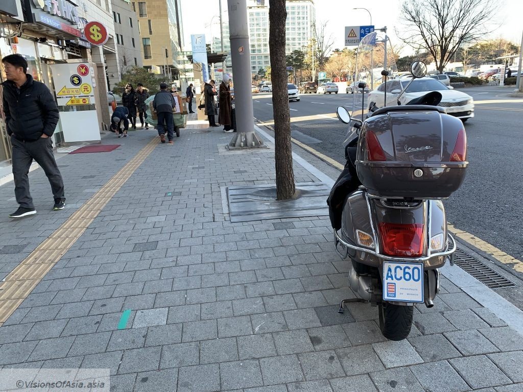 A surprising sight: a scooter with a Monaco plate in Seoul