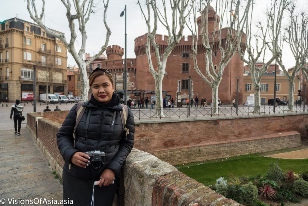 Mitchy in front of the Castillet