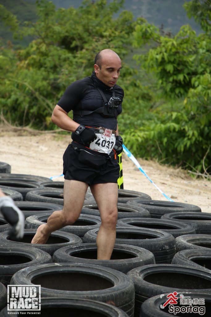 Jumping through the tyres...