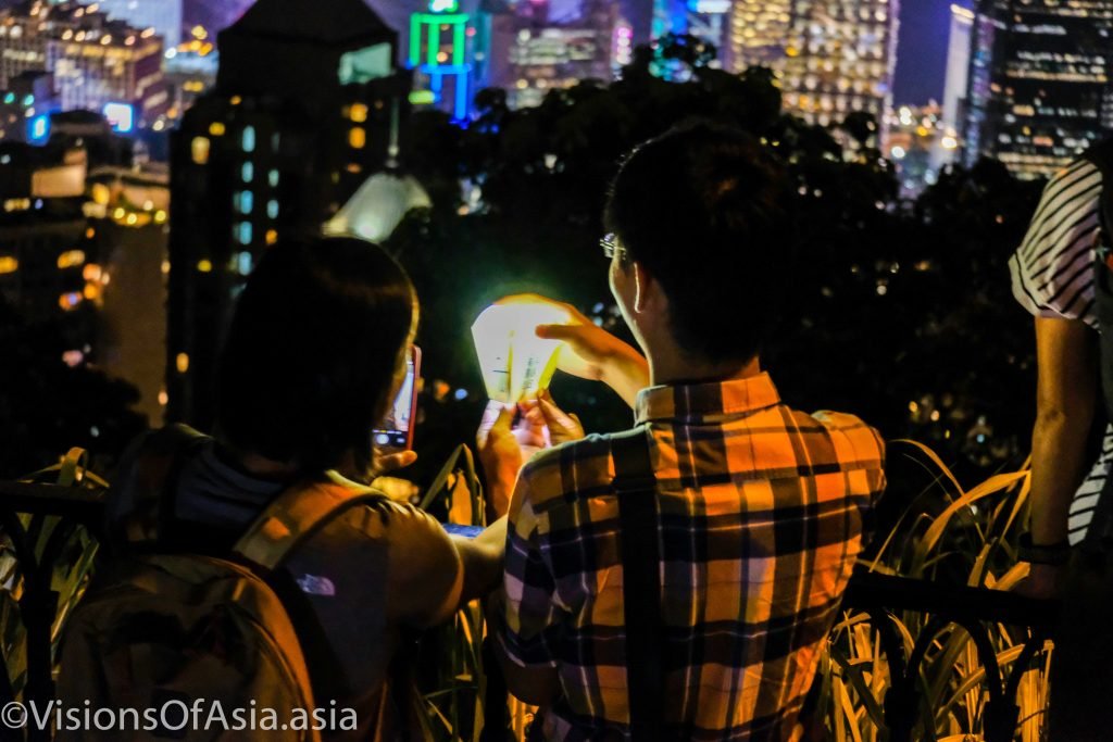 #HongKong A couple holds a lantern on the Peak