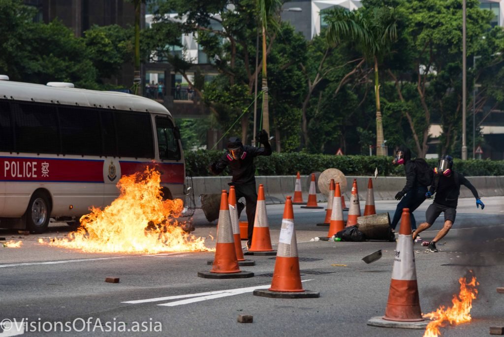 Protesters throw molotov cocktails on police vans