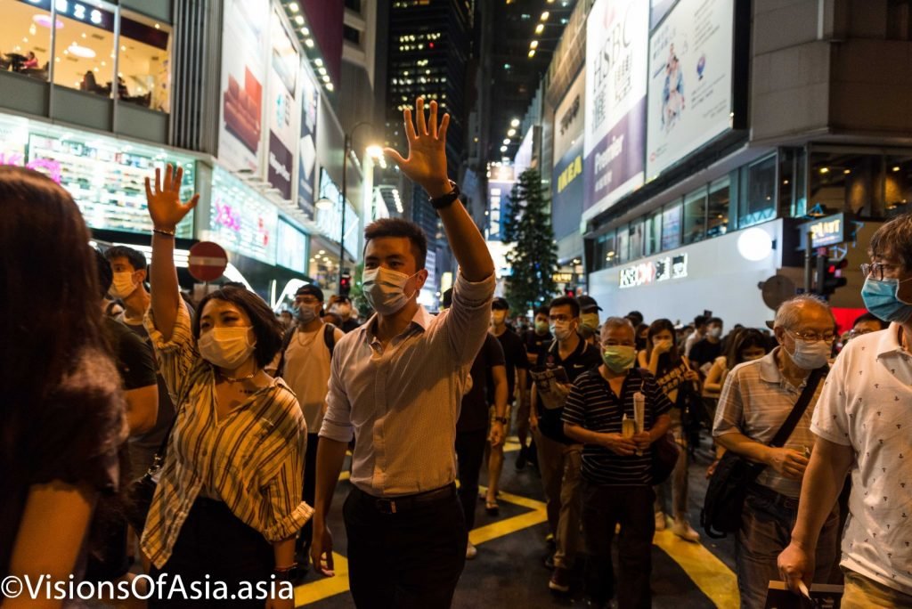 Protesters march towards Victoria park