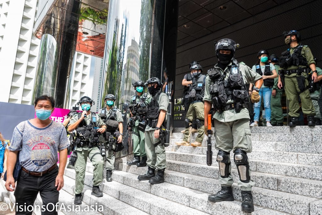 Riot police stand guard near the US consulate in Hong Kong on July 4th, 2020.