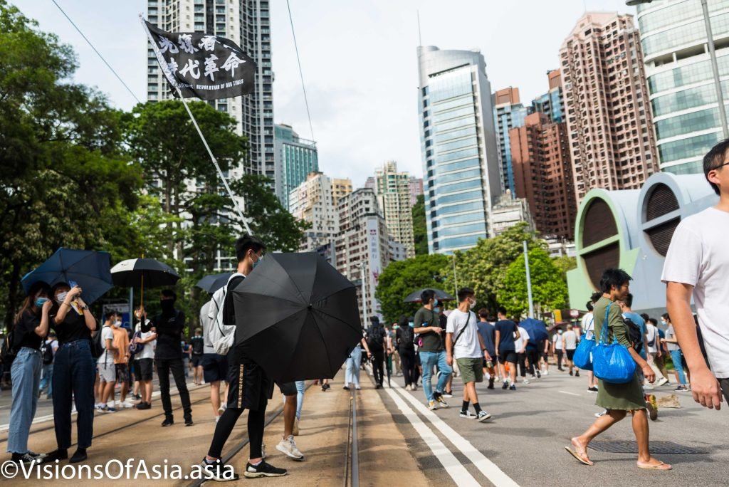 Youngsters fly the "liberate Hong Kong" flag