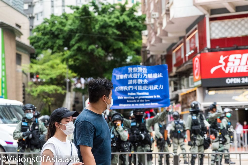 Police hoist blue flag in Tin Hau