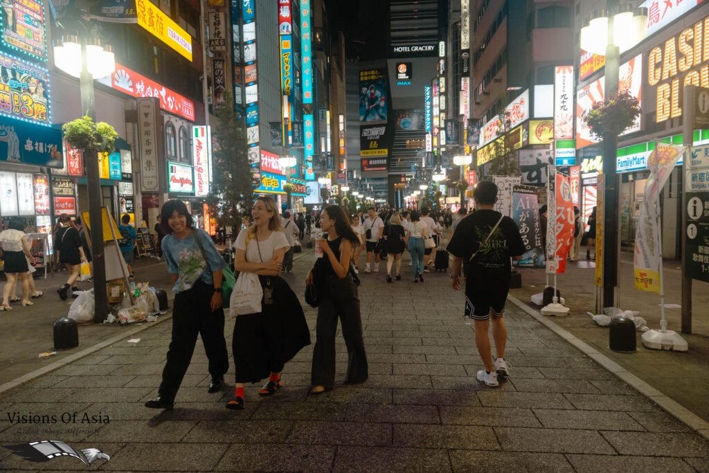 People walk in Kabukicho, the red-light area of Tokyo.