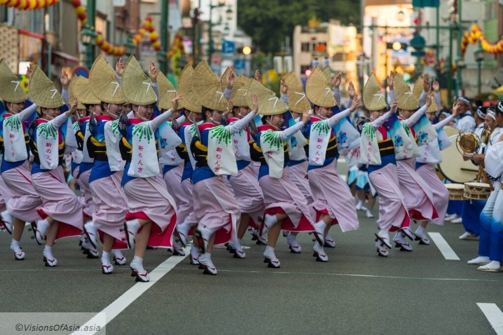 Awa Odori dancers jump together