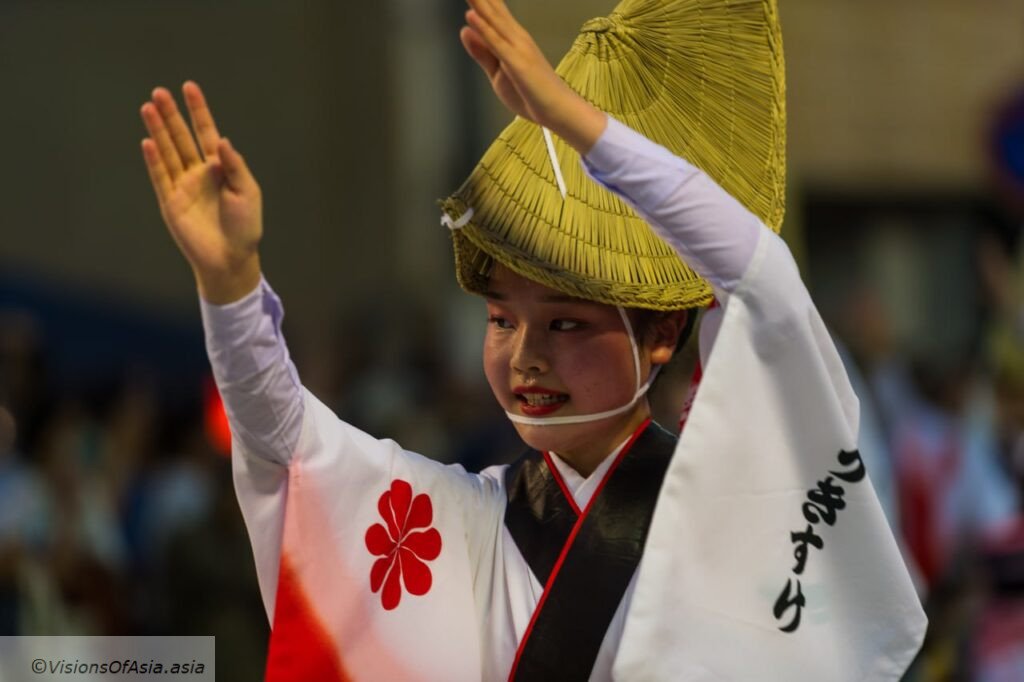 An awa odori dancer in full effort