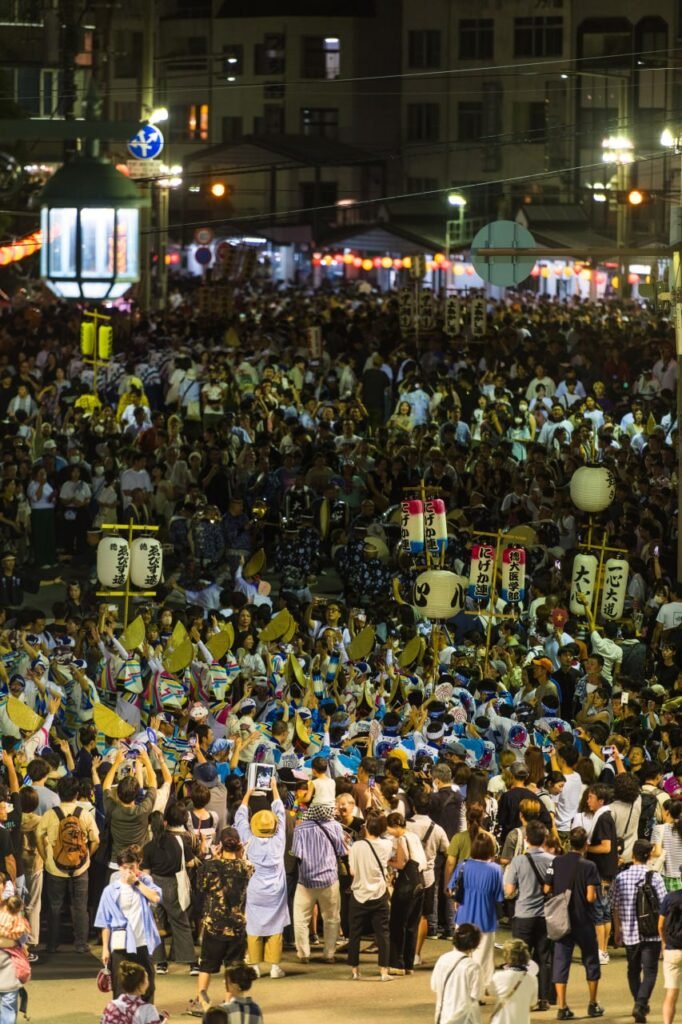 Crowds fill the streets of Tokushima in the evening