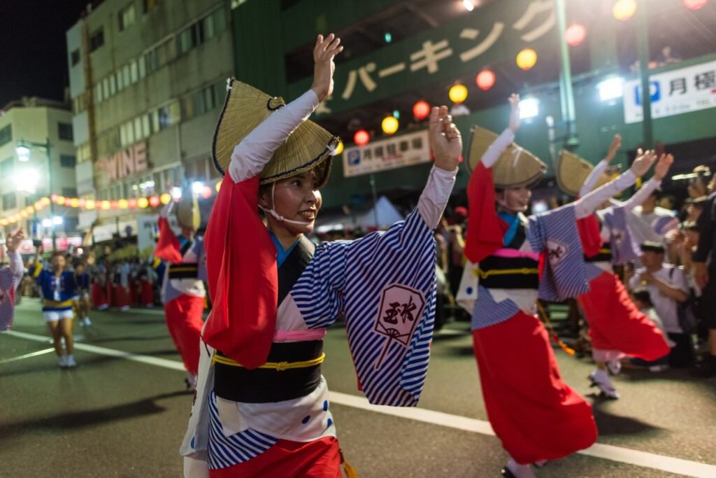 Awa odori: a dancer is seen as she nears the end of the procession.